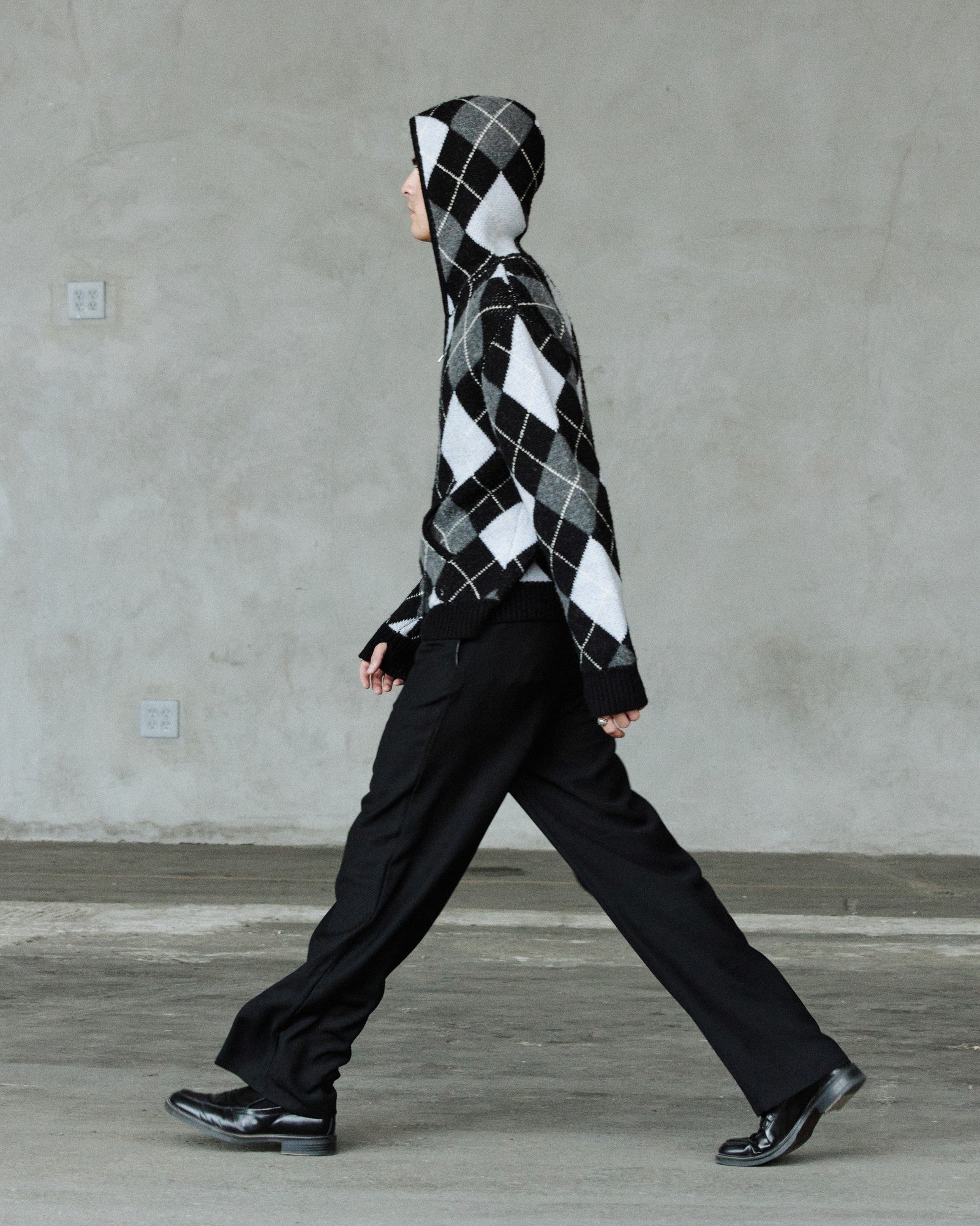 FW26 runway — argyle knit hood